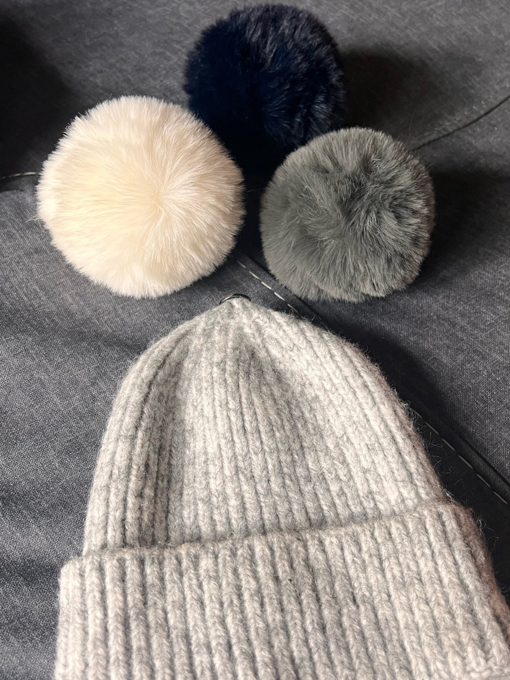 Set of 3 Pick-A-Pom Faux Fur Toppers & Gray Hat from Anthropologie